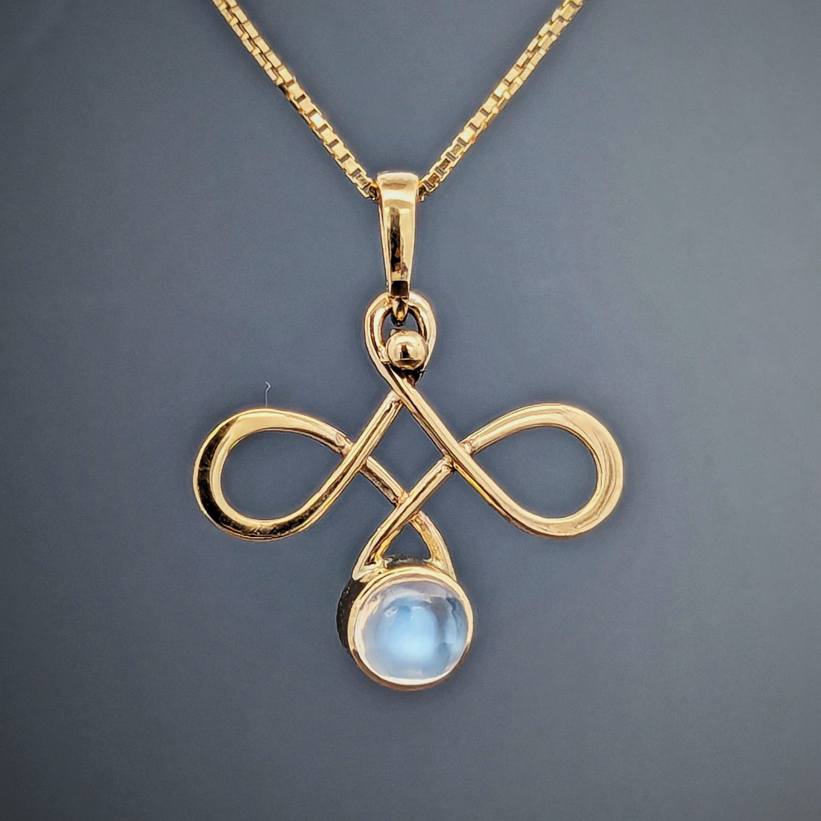 Infinity Moonstone crafted in 14 K Yellow Gold