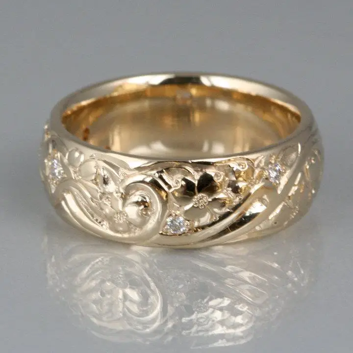 Custom hand-sculpted dogwood flower ring in sterling silver